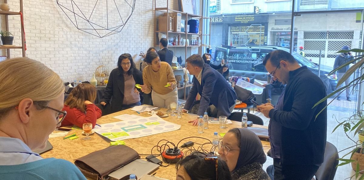 Young professionals collaborating during an entrepreneurship workshop